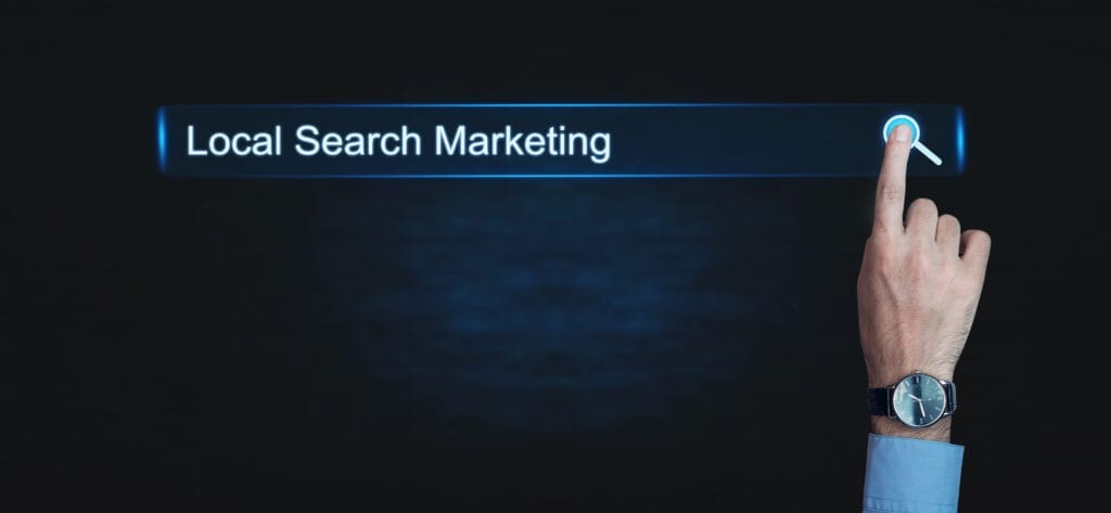 Hand pressing Local SEO button. Business concept